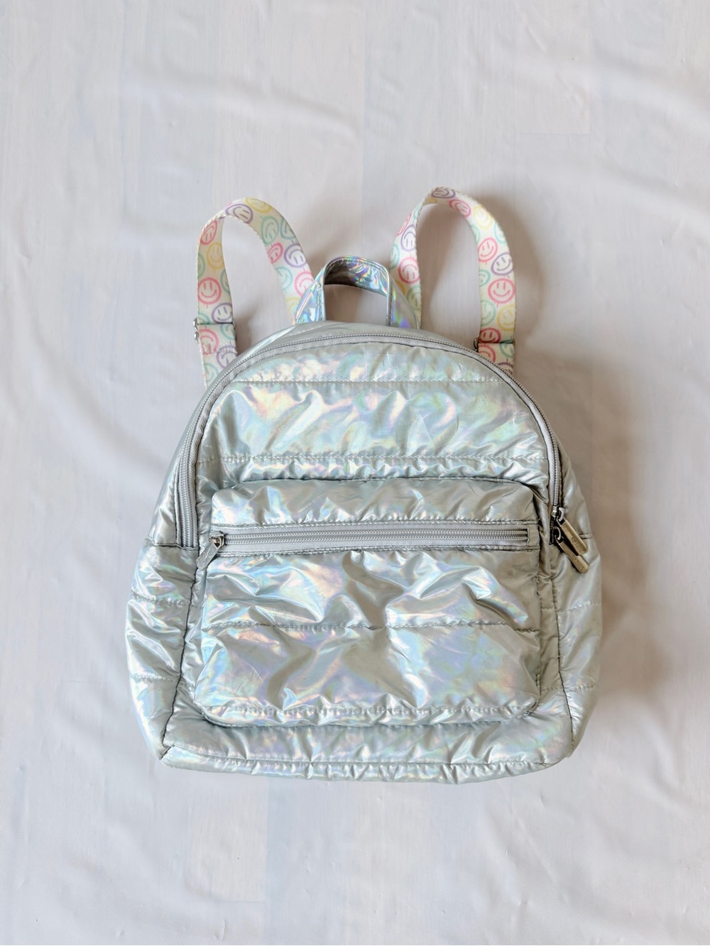 Top Trenz Iridescent Puffer Mini Backpack shiny silver finish colorful straps